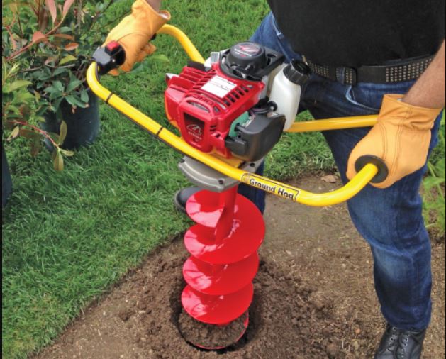 Post Hole Digger Being Used - Post Hole Rentals - Middleton Farmers Cooperative 